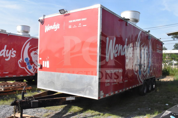 2021 Rock Solid Cargo 8.5'x28' food trailer, red with Wendy's branding, "For Delivery Only" signage, good condition.