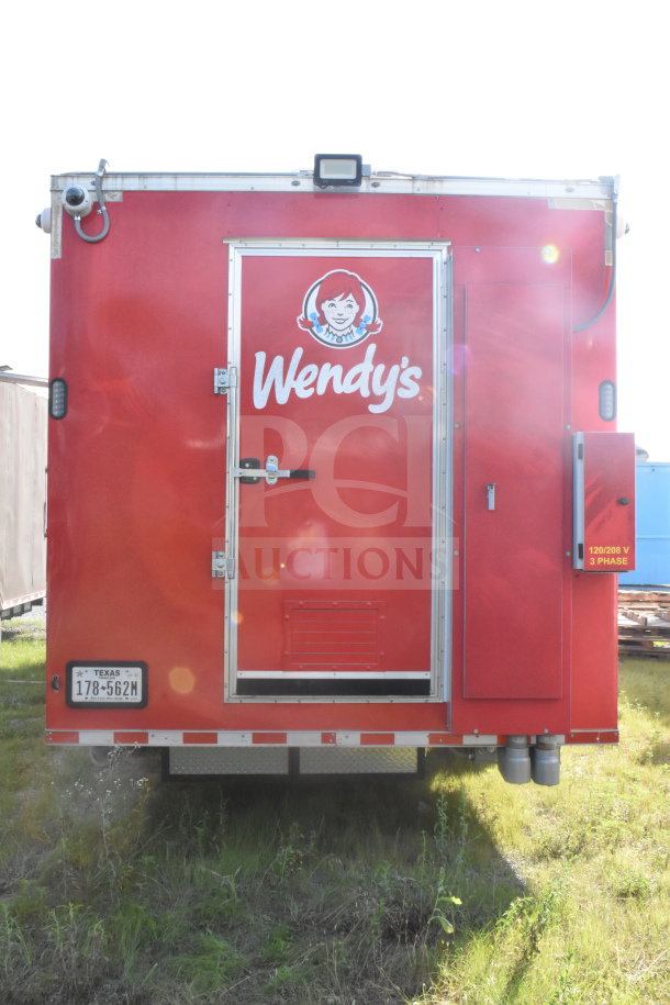 2021 Rock Solid Cargo 8.5'x28' food trailer, red, Wendy's branding, Texas license plate 178-562M, VIN 7H2BE2831MD037369.