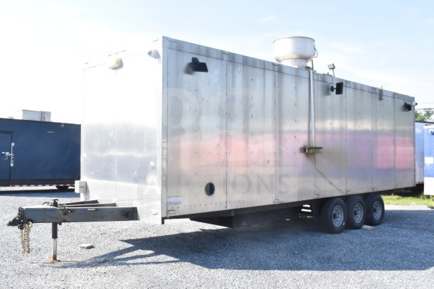 2021 Texino 8.5'x28' food trailer with stainless steel exterior, tri-axle, VIN 4B9T1EC36MM286017, in used condition.