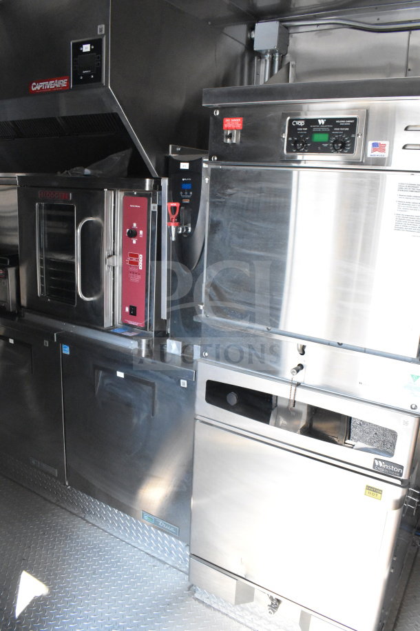 2021 Texino 8.5'x28' food trailer interior with CaptiveAire ventilation, Blodgett oven, and Winston CVap holding cabinet.
