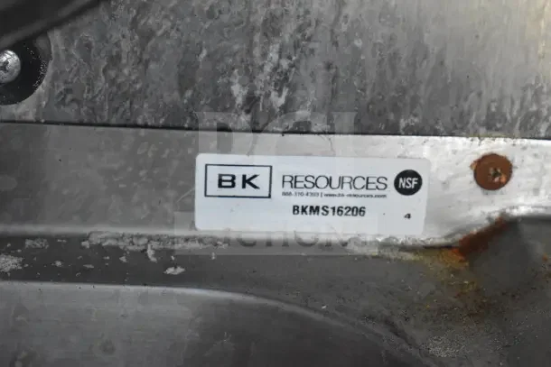 Label on Rock Solid Cargo food trailer indicating "BK Resources" with model BKMS16206, NSF certification.