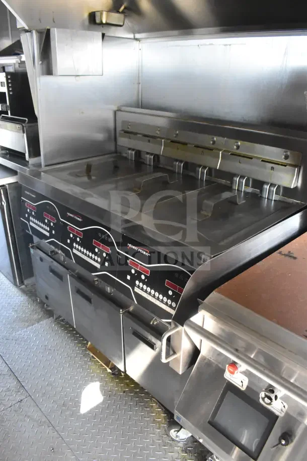 2021 Rock Solid Cargo 8.5'x28' food trailer with CaptiveAire hood, Taylor milkshake machine, and Taylor platen grill.