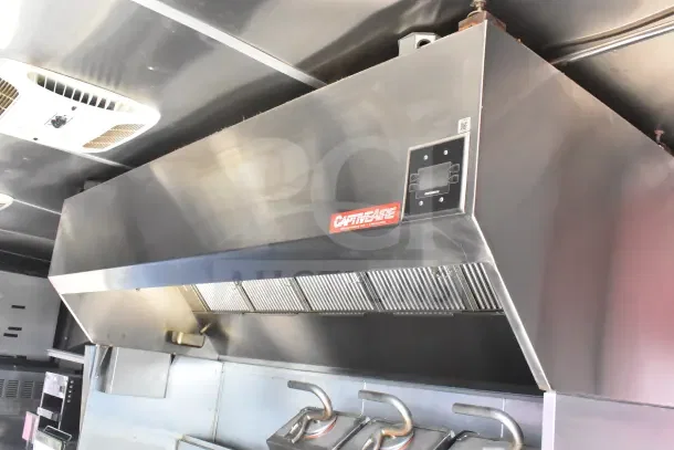 2021 Rock Solid Cargo 8.5'x28' food trailer with CaptiveAire hood, fire suppression system, refrigeration suite, Taylor milkshake machine, and platen grill.