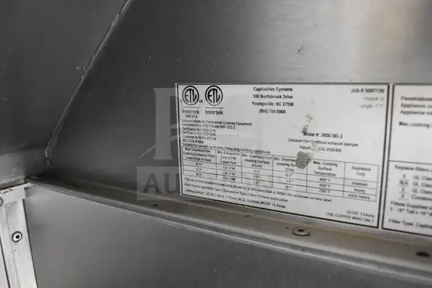 2021 Rock Solid Cargo food trailer tag detailing CaptiveAire hood and fire suppression system; model 3650 BD-2, certified for commercial use.