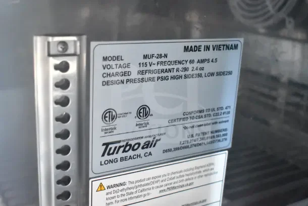 Label on Turbo Air refrigeration unit, model MUF-28-N. Made in Vietnam, 115V, R-290 refrigerant, ETL certified.