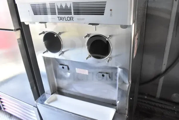 Taylor milkshake machine inside 2021 Rock Solid Cargo 8.5'x28' food trailer with refrigeration suite.