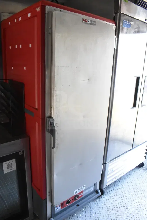 2021 Rock Solid Cargo 8.5'x28' food trailer interior showing Metro C5 3-Series heated cabinet, in used condition.