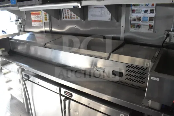 2021 Rock Solid Cargo 8.5'x28' food trailer with CaptiveAire hood, fire suppression, refrigeration, and Taylor appliances.