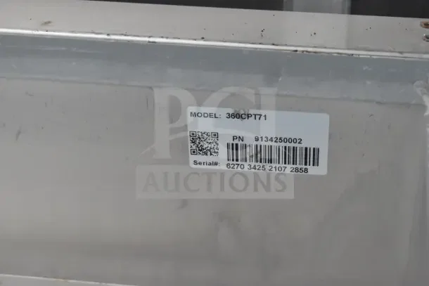 Barcode and label on Rock Solid Cargo food trailer showing model 360CPT71, PN 9134250002, and serial number.