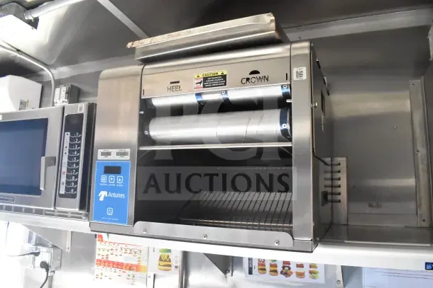 2021 Rock Solid Cargo 8.5'x28' food trailer interior, featuring Antunes equipment and control panels.