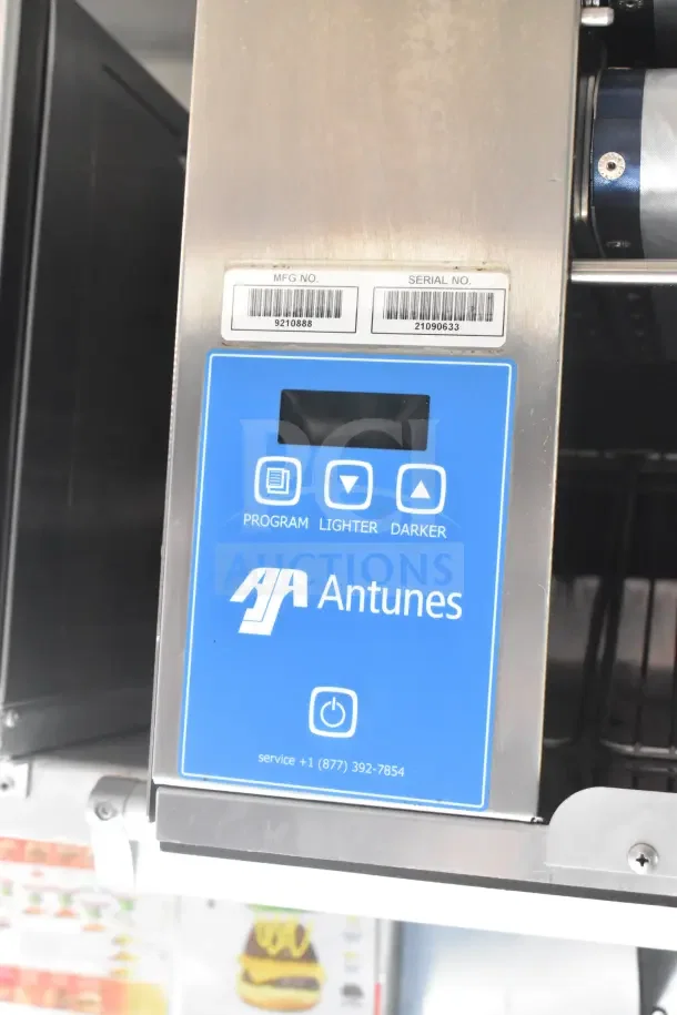 Antunes device control panel with "Program," "Lighter," "Darker" options. Shows MFG No. 9210888 and Serial No. 21090633.