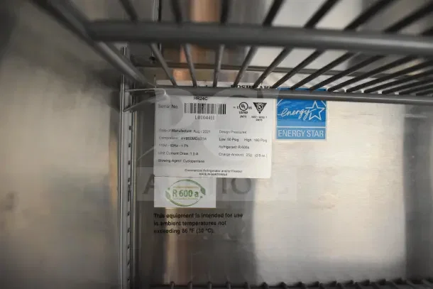 Interior of a food trailer showing Energy Star label and specifications of a commercial fridge compressor, dated Aug 2021.