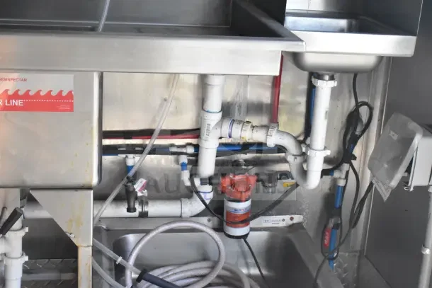 2021 Rock Solid Cargo 8.5'x28' food trailer plumbing setup; includes Seaflo pump and labeled "DRAIN LINE" system.
