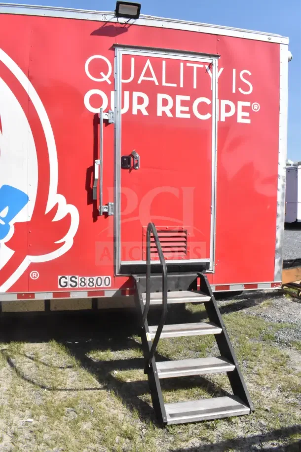 2021 Rock Solid Cargo 8.5'x28' food trailer, red exterior, side door, steps, GS8800 marking, equipped for food service.