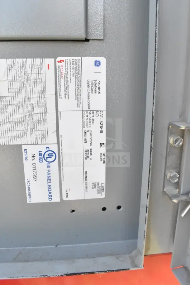 GE industrial panelboard label on 2021 Rock Solid Cargo 8.5'x28' food trailer, model A6F3844AB, 400 AMP. UL listed.