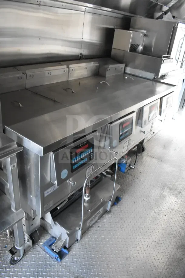 2021 Texino 8.5'x28' food trailer with CaptiveAire grease hood, fire suppression, refrigeration, breading tables.