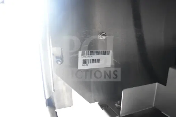 Barcode label on 2021 Texino 8.5'x28' food trailer showing identification numbers E21JD059742 and E20-18.