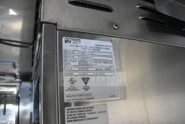 Label on a Texino food trailer with model PHB21N1-PLK01, 120 VAC, 1380 W, by Prince Castle.