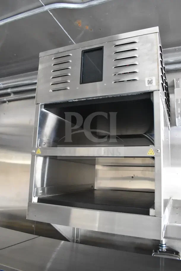 2021 Texino food trailer with CaptiveAire grease hood, fire suppression, and stainless steel interior.