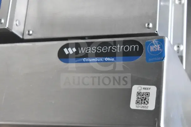 Stainless steel surface with Wasserstrom label, Columbus, Ohio, and NSF certification sticker visible.