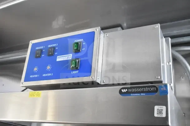 2021 Texino food trailer control panel with switches for heaters and light, labeled Prince Castle Inc. Wasserstrom label visible.