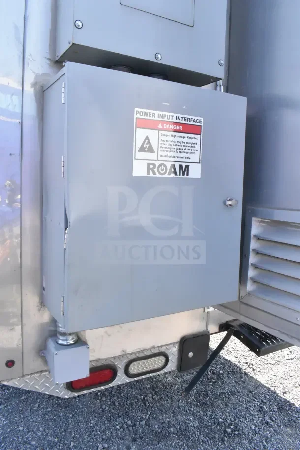 2021 Texino 8.5'x28' food trailer; visible power input interface with warning label.