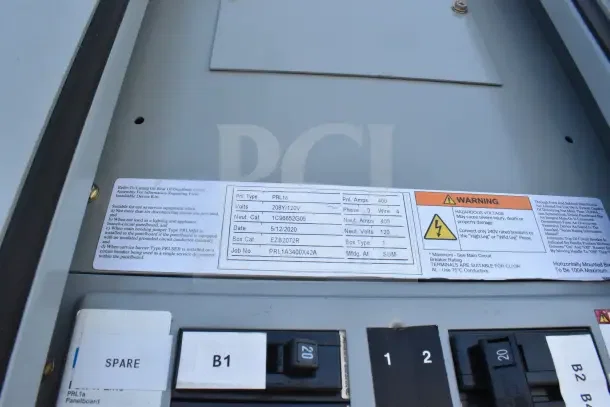 Electrical panel with detailed specifications. Includes voltage (208V/120V), phase (3), and warning label for hazardous voltage.