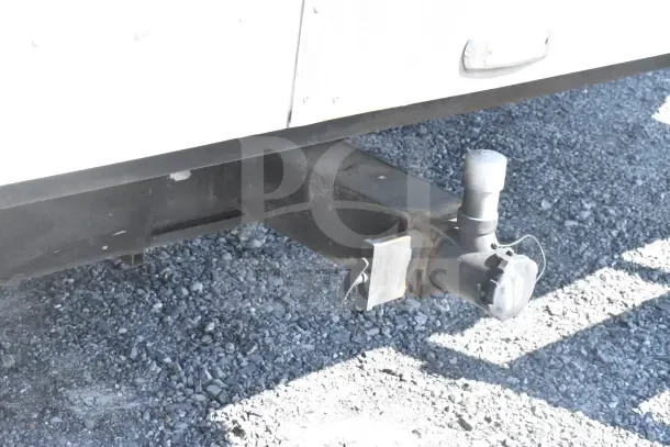 2021 Texino 8.5'x28' food trailer hitch, showing sturdy metal construction and attachment components.