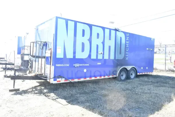 2020 Diamond Cargo 24' commercial kitchen trailer with grease hood. Equipped with Pitco fryer, Wells dual griddle, Arctic Air refrigeration. VIN 53NBE2424M1083695. Marked "NBRHD Kitchens."