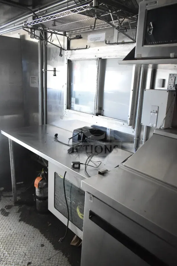2020 Diamond Cargo 24' kitchen trailer, stainless steel interior, prep station, and Arctic Air refrigeration visible.