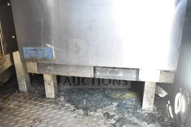 2020 Diamond Cargo 24' kitchen trailer showing Arctic Air commercial freezer base. Visible dirt and wear on flooring.