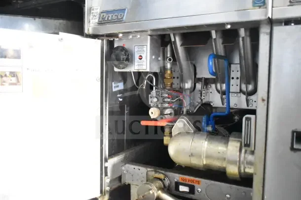 2020 Diamond Cargo kitchen trailer with Pitco fryer mechanics visible, showcasing internal components and wiring.