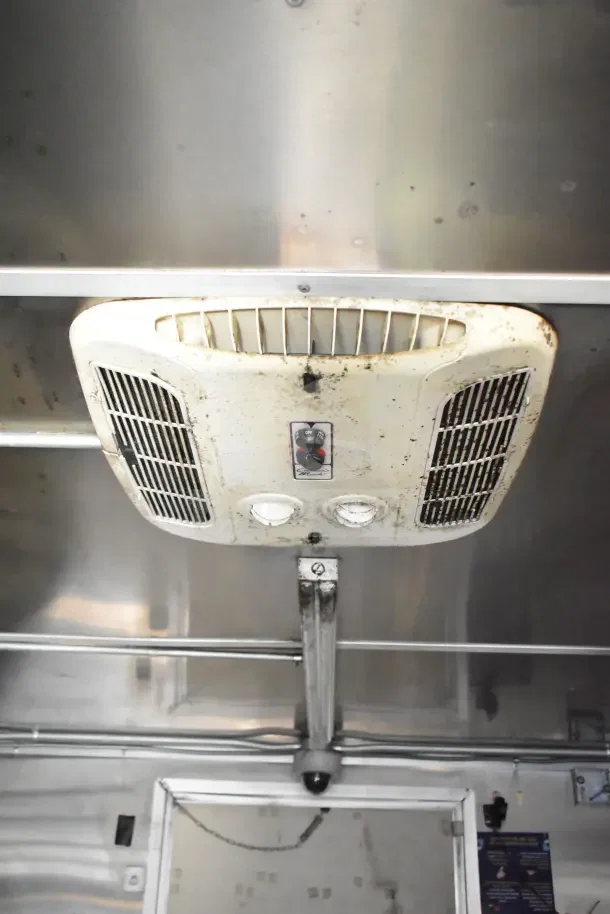 Interior view of 2020 Diamond Cargo 24' Kitchen Trailer showing ceiling-mounted ventilation system. Visible wear on unit.