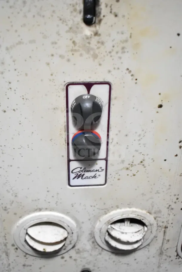 2020 Diamond Cargo Commercial Kitchen Trailer details with Coleman Mach control panel featuring dials for settings.