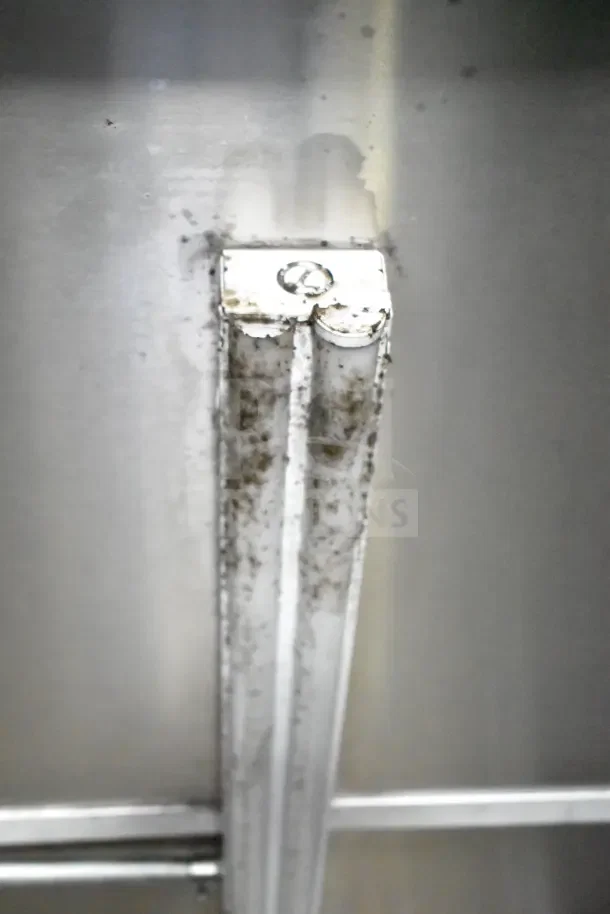 Close-up detail of the interior metal structure of a 2020 Diamond Cargo kitchen trailer. Some signs of wear visible.