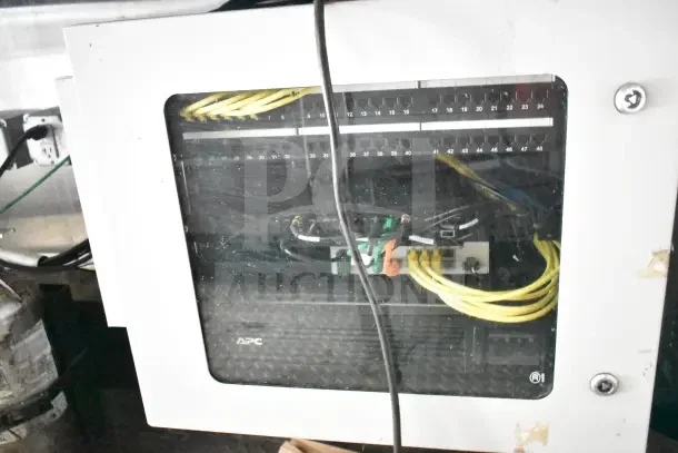 Electrical panel inside 2020 Diamond Cargo commercial kitchen trailer, showing wiring and APC branding.