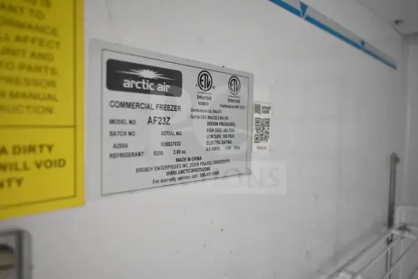 Label on Arctic Air Commercial Freezer model AF23Z, includes serial H20027032, design pressures, electric rating data.