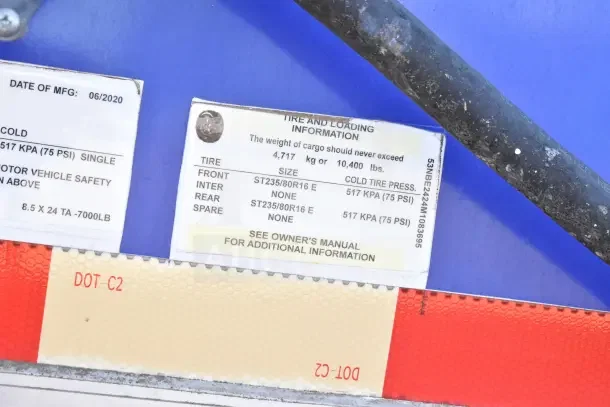 2020 Diamond Cargo 24' kitchen trailer label showing tire and loading info, manufactured in 06/2020.