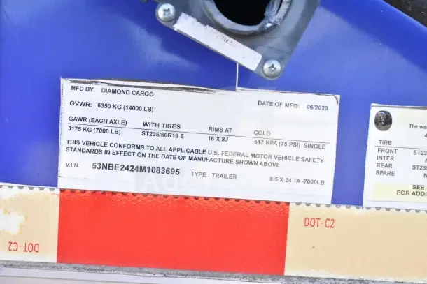 2020 Diamond Cargo 24' kitchen trailer label, VIN 53NBE2424M1083695, shows GVWR and tire specifications.