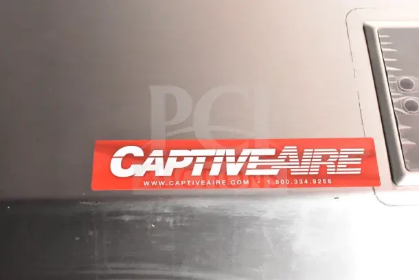 CaptiveAire ventilation system label on the 2022 Rock Solid Cargo Ghost Kitchen Trailer, featuring premium kitchen equipment.