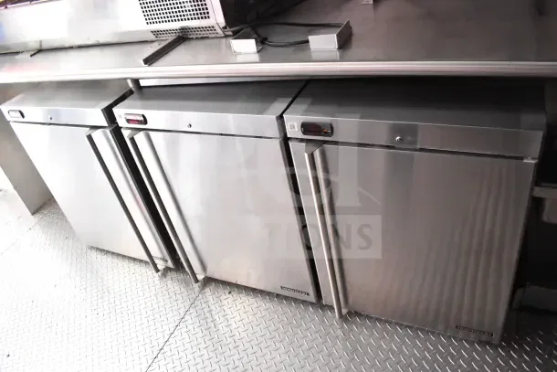 Rock Solid Cargo 8.5x28 trailer interior showing stainless steel Hoshizaki refrigeration units.
