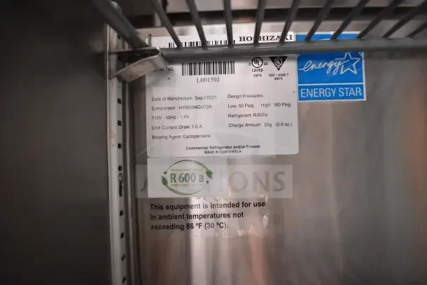 Hoshizaki refrigeration label detailing specs: R-600a refrigerant, HYB50MGU72A compressor, 115V, Energy Star certified.