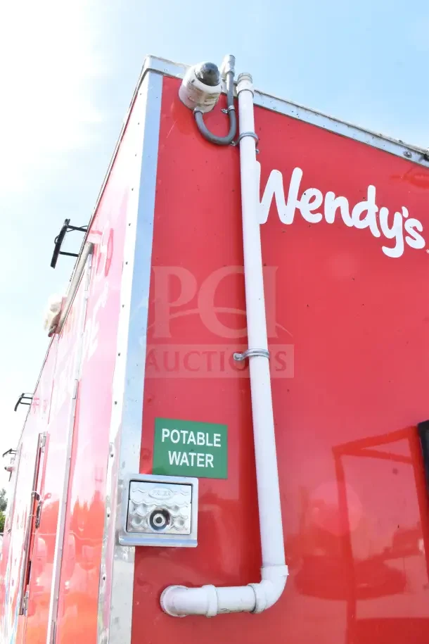 2022 Rock Solid Cargo 8.5x28 Wendy's Ghost Kitchen Trailer, vivid red exterior, "Potable Water" label, VIN 7H2BE2831ND043576.