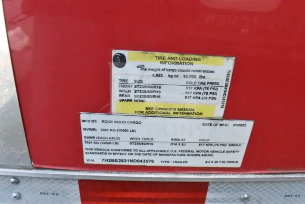 2022 Rock Solid Cargo trailer label, shows tire sizes ST235/80/R16, max load 10,700 lbs, VIN: 7H2BE2831ND043576.