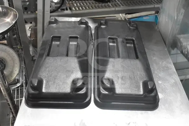 Protective covers for Stoelting SF121-38I2 soft serve machine parts, black, sturdy plastic, excellent condition.