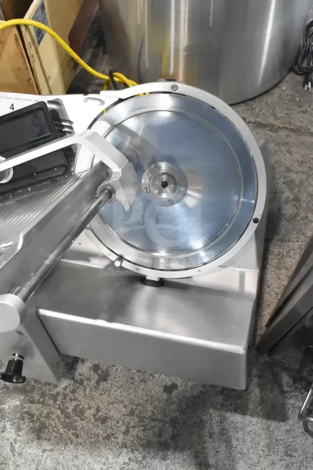 2016 Bizerba GSP HD 13" heavy-duty automatic meat slicer, clean condition, 120V, 1 phase, gravity feed, illuminated.