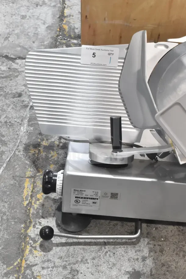 Bizerba SE 12 US Commercial Meat Slicer, 120V, 1 Phase, features adjustable blade, sturdy base, and operational knobs.