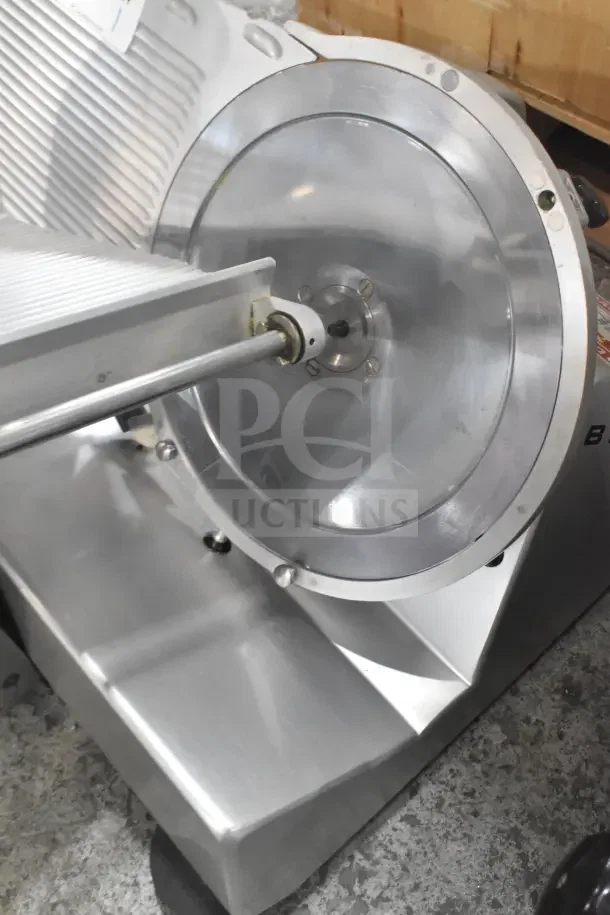 Bizerba SE 12 US commercial meat slicer, 120 volts, 1 phase, stainless steel body, clean and well-maintained condition.