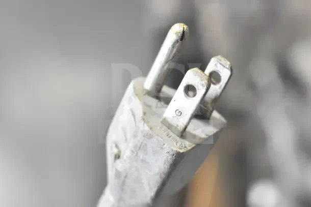 Close-up of a power plug for a Bizerba SE 12 US Commercial Meat Slicer, suitable for 120 volts, 1 phase.
