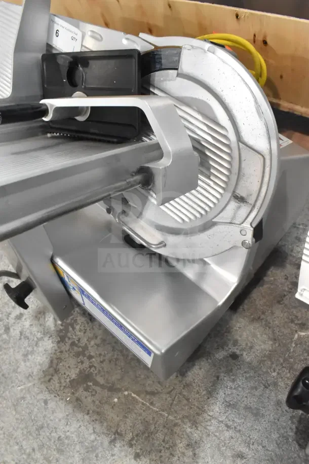 Bizerba GSP HD 13" automatic gravity feed meat slicer in fair condition, 120V, with visible usage marks.